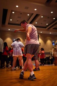 people smiling and dancing