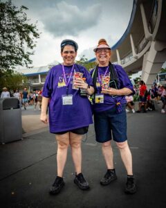 people smiling at Disney world